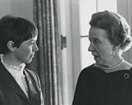 Nancy Greene, Olympic ski champion, chatting with Mrs. Roland Michener at a reception in Government House, Ottawa 27 February 1968