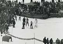 Nancy Greene being interviewed at the end of her gold medal run in giant slalom at the 1968 Winter Olympic Games 15 February, 1968