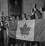 Members of Parliament with flag at the time of closure during the flag debate Dec. 1964.