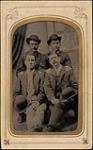 Group of four men 1860-1950