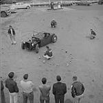 Stock Car Story. Club members of the Winnipeg Roadsters are tested for their driving skill and ability September 1959.