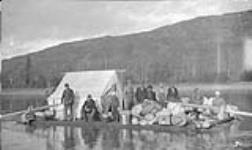 Cautley's crew rafting down Peace River. Alberta-BC boundary survey 6 October 1919.