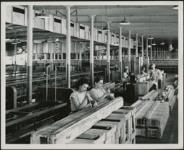 [Women working in warehouse - Long Sault Fabrics] 1963