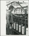 [Man tends Machine - Long Sault Fabrics] [1984]