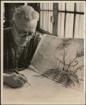 [Man designing fabric by hand] [ca. 1960]