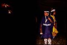 [Two First Nations girls wearing regalia] July 1972