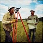 [Two men surveying] [between 1900-1976]