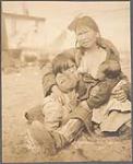 [Inuit woman breast feeding at King's Island, Alaska]. Original title: Mickaninnies Kow-Kow 1904