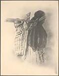 [First Nation woman carrying baby on a cradleboard with a tumpline]. Original title: Indian Squaw and Papoose [between 1870-1910]