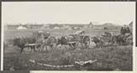 H.B. Co. [Hudson's Bay Company] portaging the fur at Fort Smith [N.W.T.] 1903