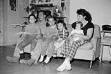 [Burton Kewayosh, his wife, Aleta and their family] [between 1957-1959]