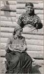 [Anishinaabe women, Mrs. Hitchen (below) and Mrs. Finlayson (above) demonstrating string figures] [ca. 1916]