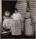 [Sarah Lone (right) and a Seneca woman (left) and child] 1912