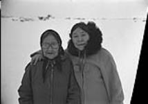 [Kenojuak Ashevak outside with her mother Silaqqi] 1980