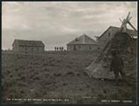 [View of topek and buildings at Hudson's Bay Company Post Fort McPherson]. Original title: Fort McPherson, the Most Northerly Post of the H.B.Co [ca. 1901].