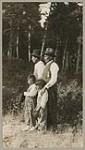 [Two Anishinaabe men and their sons] 1920