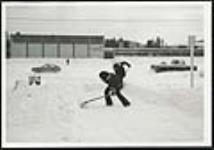[Teens shoveling snow] [ca. 1970-1980]