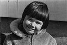 [Yvette Paul smiles at the camera, Mi'kmaq Reserve, Millbrook] [ca. 1969].