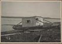 Metering scow [of the Tidal and Current Survey] hauled up on beach 28 August, 1923.