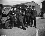 Above are shown some of the crew of the Canadian Canso Flying boat "C for Charlie" before setting out on an anti-submarine patrol in the North Atlantic. The Canadian Squadron is operating successfully from Iceland. From left to right they are Sgt. F. Scott, of Pakenham, Ont.; F/O Denny Denimy, Chatham, Ont; F/O S. Matheson, of Nelson, B.C.; F/L D. E. Hornell, of Mimico, Ont.; F/O G. Campbell of Vancouver, B.C 22 June 1944