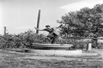 [Gabor Szilasi posing in a fountain] 1954-1956.