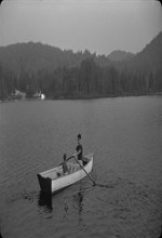 [Gabor Szilasi and Andrea Szilasi in a rowboat on Lac Sainte-Marie] July 1967