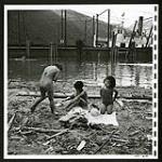 The beach at Slocan City is a fine place for young Japanese evacuee children to swim, play and boat [1945/06/16-1945/06/28]