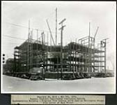 Federal District Improvement Commission Records. Confederation Building - Progress view looking north west on Wellington Street from corner of Bank Street 1929