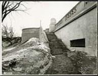 [Railing and staircase from Plaza Bridge leading down to the west bank of the Rideau Canal] March 24, 1939