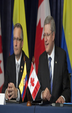 [Prime Minister Stephen Harper and Edward Fast, Minister of International Trade, host a roundtable discussion with Canadian and Colombian businesses in Bogotá, Colombia] 10 August 2011