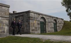 [Prime Minister Stephen Harper and Steven Blaney, Minister of Veterans Affairs, walk through the North Passage at Fort Lennox in Saint-Paul-de-l'Île-aux-Noix, Quebec, prior to announcing new battle honours commemorating the War of 1812] 14 September 2012