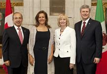 [Prime Minister Stephen Harper and his wife Laureen Harper pause for a photo with Felipe Calderón, President of Mexico, and his wife Margarita Zavala between meetings on Parliament Hill] 27 May 2010