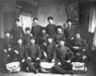 [Group portrait of uniformed letter carriers] [graphic material] 1883