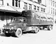 [Postal truck delivering mail, Calgary, Alberta] [graphic material] 2 December 1959
