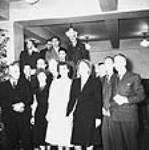 [Group portrait at Christmas party] [graphic material] [between 1939 and 1945]