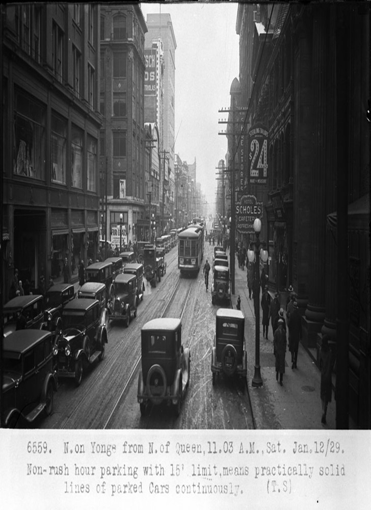 Historic photo from Saturday, January 12, 1929 - Scholes Hotel - looking north on Yonge Street from north of Queen Street - Saturday traffic 11:03am in Downtown