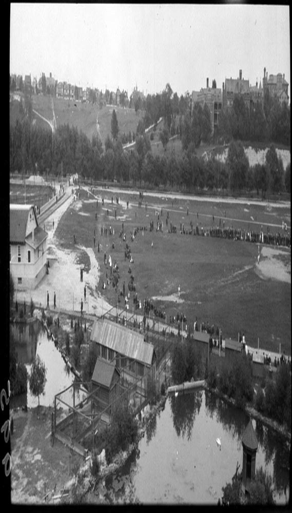 Historic photo from Saturday, July 4, 1914 - Looking across Riverdale Zoo to a general view of games in Riverdale Park in Riverdale park