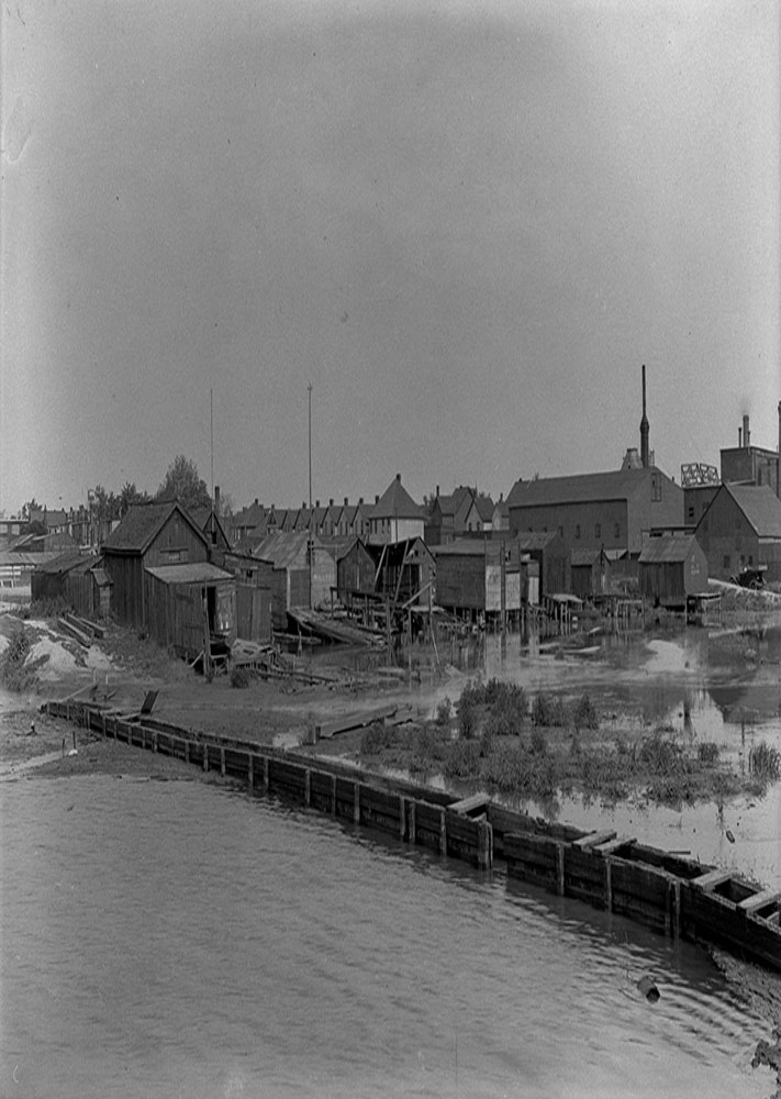 Historic photo from Tuesday, August 31, 1915 - Foot of Carlaw Ave - houses and industrial buildings in Cherry Beach