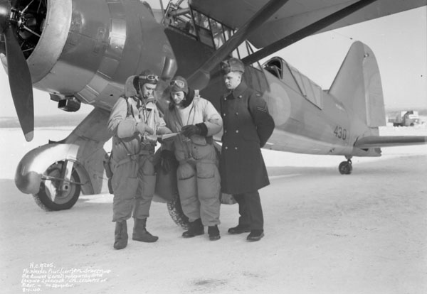Flying Officer Waddell and  Corporals Streeting and Lecompte with Westland Lysander II aircraft 430 of No.110(AC) Squadron, Royal Canadian Air Force (R.C.A.F.), Rockcliffe, Ontario, Canada, 8 January 1940.