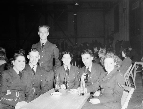Unidentified airmen and airwomen at a station dance in the Drill Hall, R.C.A.F. Station Rockcliffe, Ontario, Canada, 29 January 1944.