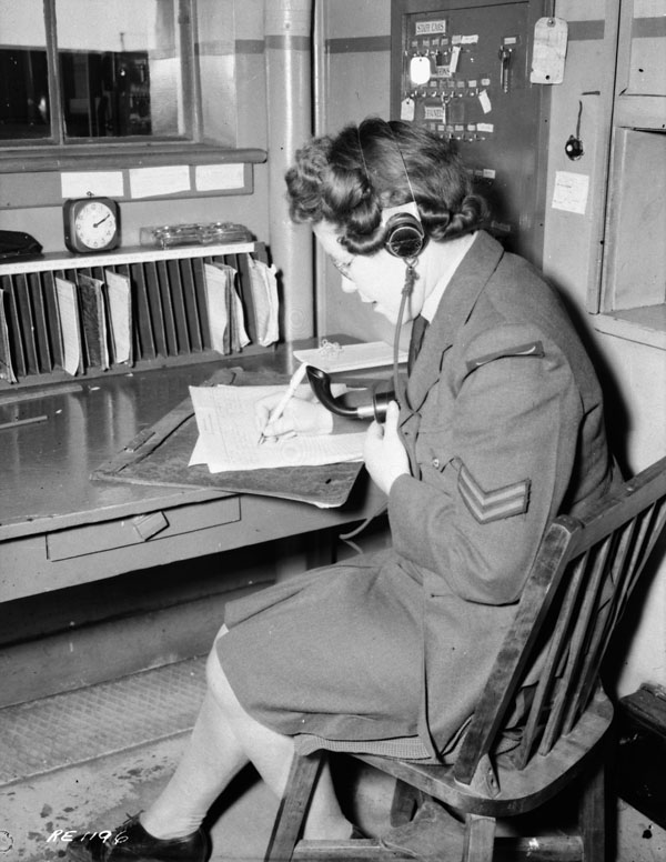 Corporal Rankin, a dispatcher in the Motor Transport Section, R.C.A.F. Station Rockcliffe, Ontario, Canada, 1 March 1944.