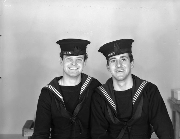 Ordinary Seamen R.C. Reeves (left) and R.D. Nelson, both Anti-Aircraft Ratings Third Class, Royal Canadian Navy Gunnery School, H.M.C.S. CORNWALLIS, Halifax, Nova Scotia, Canada, 15 January 1943.