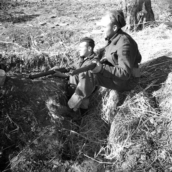 Pte. Clarence Albers and Pte. John Harwood of the Perth Regiment overlooking Orsogna, Italy, 29 January 1944.