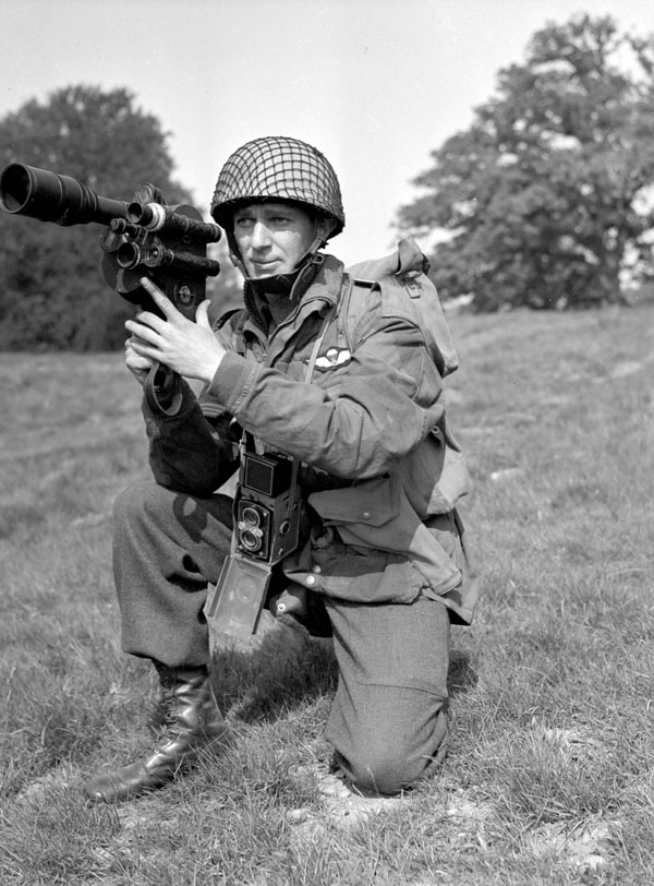 Sergeant Elmer R. Bonter of the Canadian Army Film and Photo Unit attached to the 1st Canadian Parachute Battalion, England, 11 May 1944.