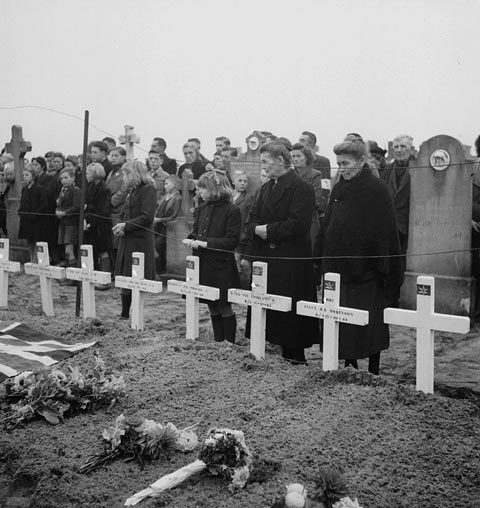 Dutch civilians attending the burial of 55 infantrymen of 