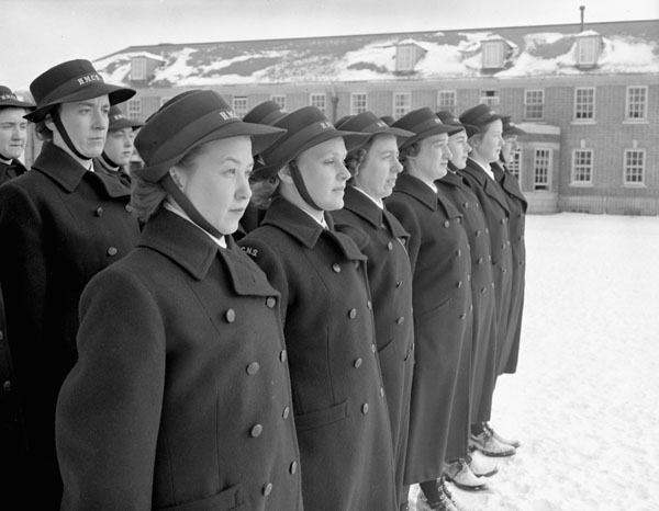 Personnel of the Women's Royal Canadian Naval Service (W.R.C.N.S.) drilling on the parade square during initial training at H.M.C.S. CONESTOGA, Galt, Ontario, Canada, December 1943.