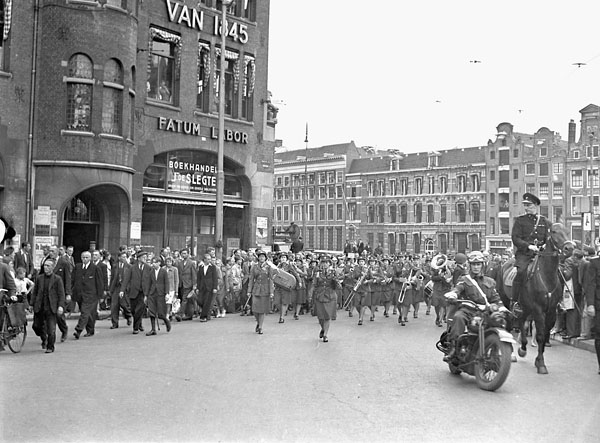 The Canadian Women's Army Corps (C.W.A.C.) Brass Band en route from the Royal Palace to the City Theatre, Amsterdam, Netherlands, 25 July 1945.