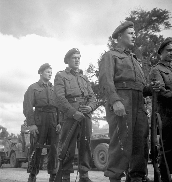 French-Canadian personnel attending a Mass celebrating Bastille Day, Rots, France, 13 July 1944.