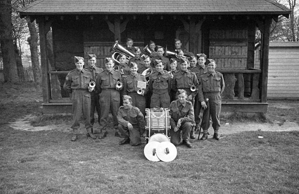 Band of the 1st Battalion, The Royal Winnipeg Rifles, taking part in a sports meet, England, 23 April 1942.