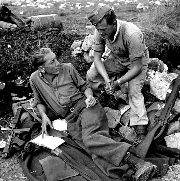 Private Danny Dafoe and Lance-Corporal L.H. MacWilliam, both of Princess Patricia's Canadian Light Infantry (P.P.C.L.I.), in a slit trench, Spinete, Italy, ca. 22-23 October 1943.